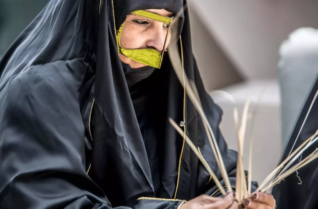 Where to experience authentic Emirati culture in Abu Dhabi?